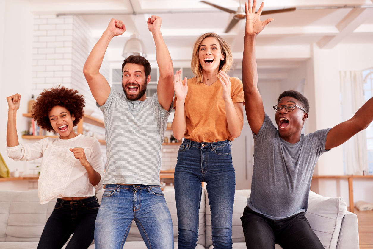 Friends celebrate winning lotto results